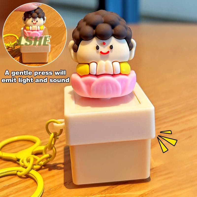 [LSHE] ใหม่พระน่ารักบุญ +1 พวงกุญแจความเครียดบรรเทาการ์ตูนพระพุทธรูปเสียงและแสงสํานักงานบีบอัด Pure Mind พวงกุญแจใหม่