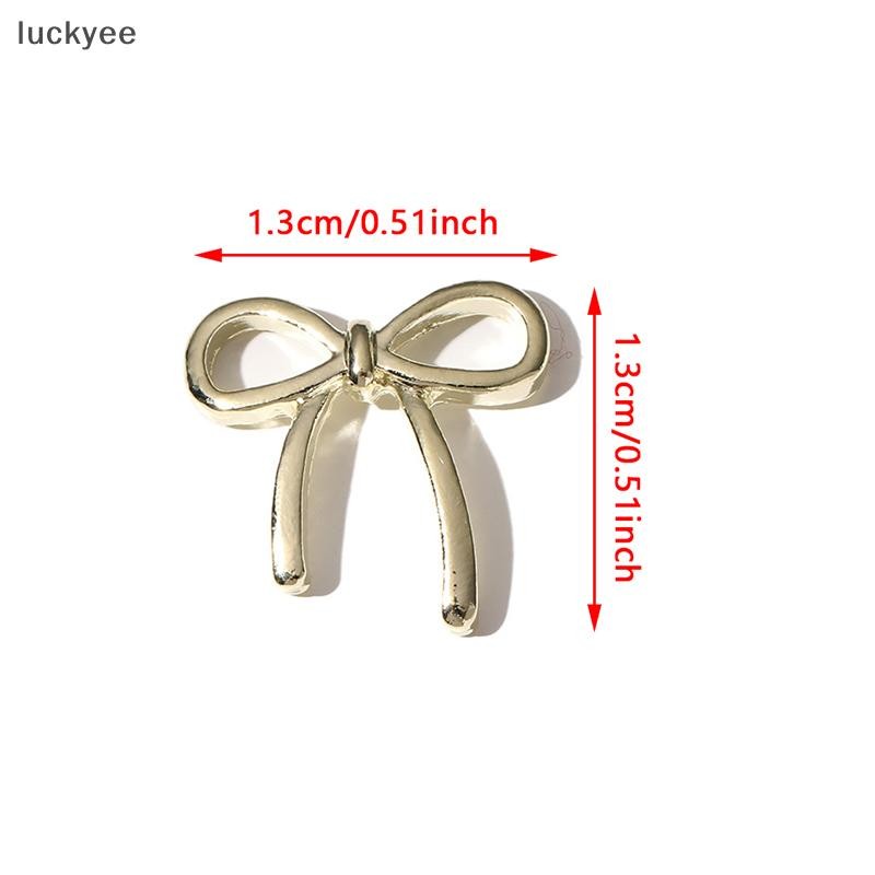 Luckyee 10 ชิ้น Bow Deco เล็บ Charm 3D เงิน/ทอง Bowknot ริบบิ้นตกแต่งเล็บอะไหล่ DIY หรูหราเล็บอุปกรณ์เสริม TQ