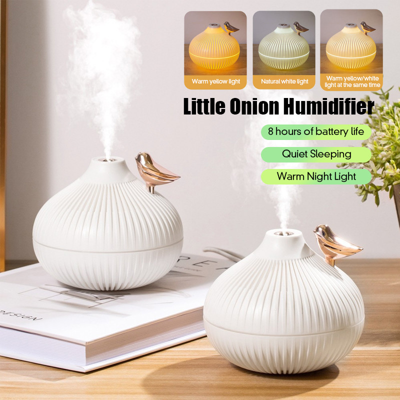 เครื่องเพิ่มความชื้น พ่นไอน้ำอโรม่า ขนาด 300 ml.มีไฟ 3 สี LED สวยหรู สามารถเพิ่มน้ำมันหอมระเหย พ่นไอน้ํา
