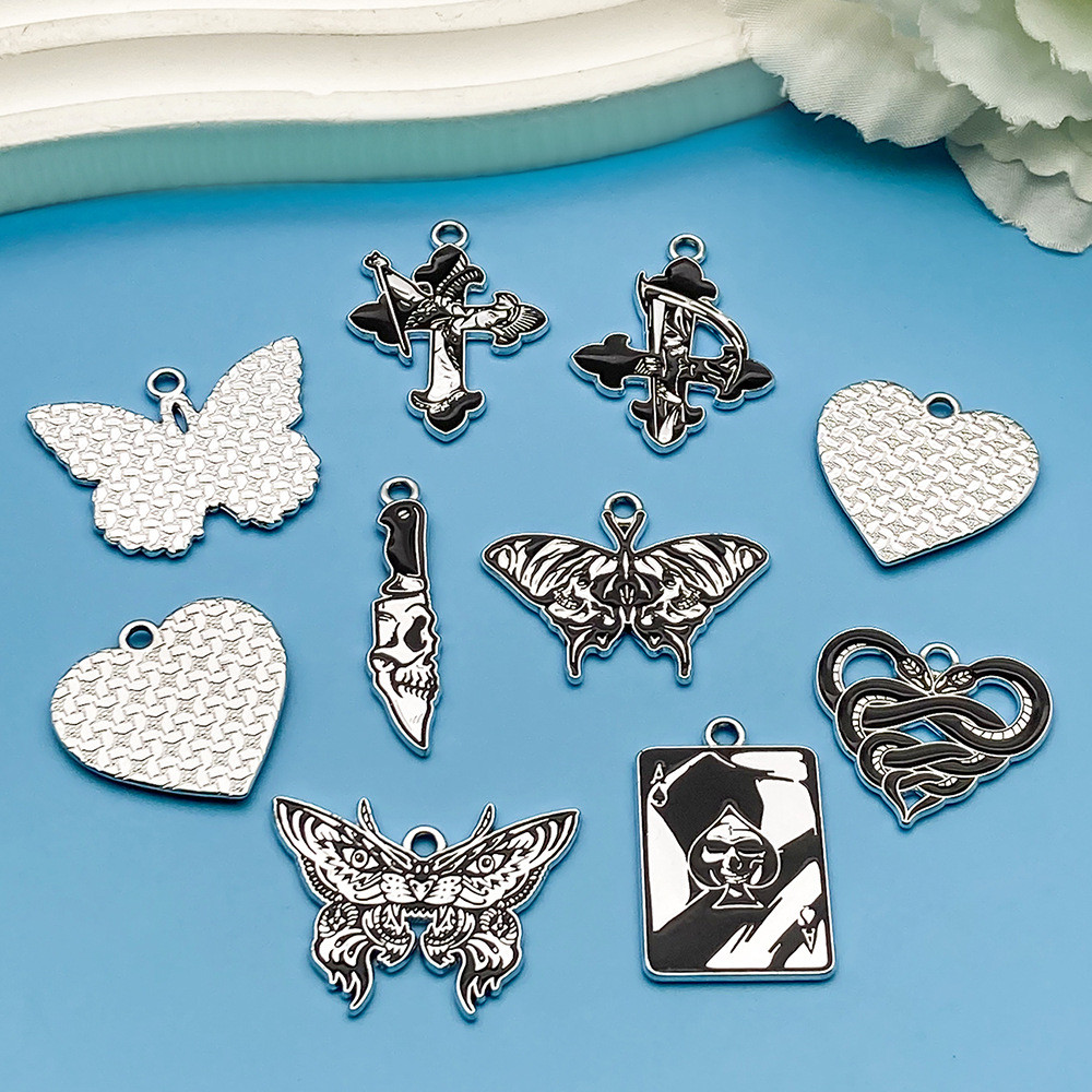 จี้โลหะผสมรูปหัวกะโหลกผีเสื้อหัวใจสีขาว K สไตล์โกธิคสีเข้ม DIY เครื่องประดับทำมือ - รูปที่ 2