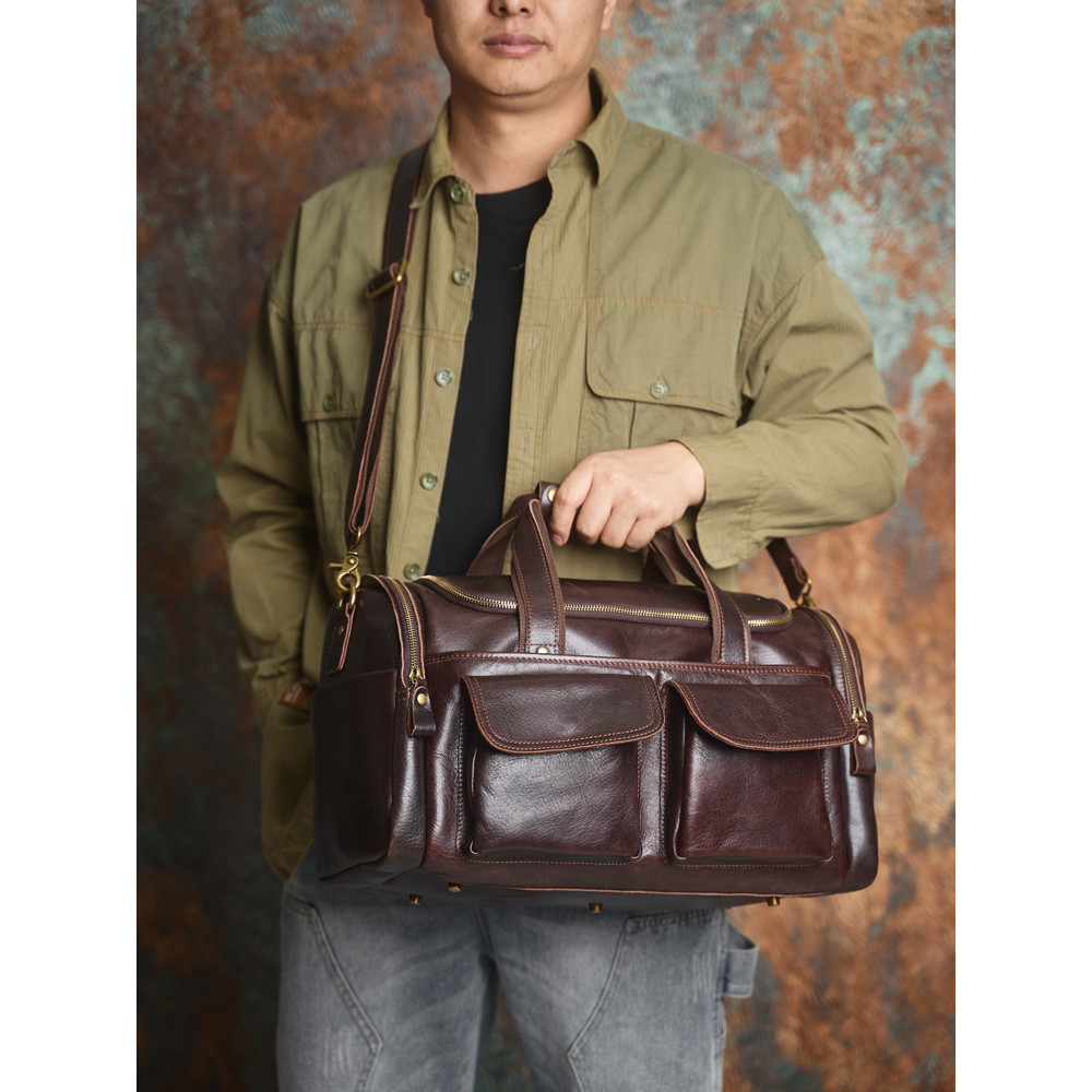 NAVSA หนังแท้ผู้ชาย Retro Duffel กระเป๋าขนาดใหญ่ความจุ First Layer Cowhide กระเป๋าเดินทางระยะทางสั้นแฟชั่นสบายๆ Messen