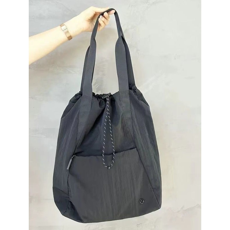 กันน้ํามัลติฟังก์ชั่กระเป๋าเป้สะพายหลัง ยู นิสซ์ กระเป๋าเป้สะพายหลังกีฬาผ้าไนลอนกระเป๋าพร็อพกระเป๋าสะพาย เชือกรูด กระเป๋าถือ