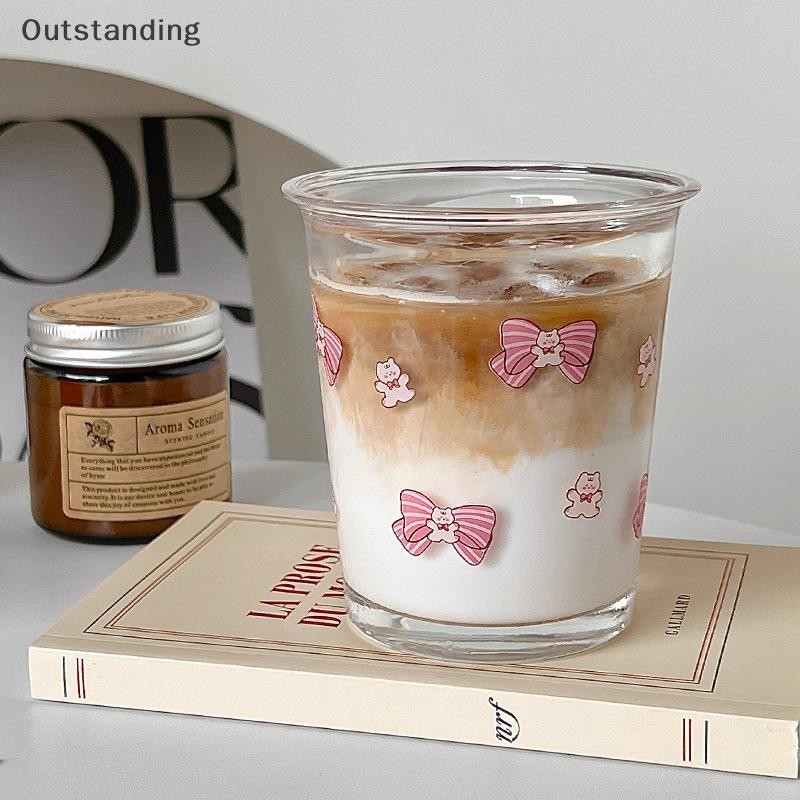 แก้วโบว์ที่โดดเด่นถ้วยน้ําน่ารักการ์ตูนโบว์ถ้วยแก้วลายน่ารัก ดูเดิล แก้วกาแฟครัวเรือนผลไม้ชาน้ํามะนาวสาวของขวัญใหม่