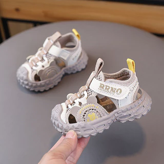 ฤดูร้อนสไตล์ใหม่ชายหญิงเด็กเด็กเด็กทารกนุ่มSoled Casual Toe-Covered รองเท้าแตะสุทธิรองเท้าชายหาด
