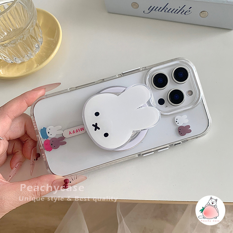 การ์ตูนน่ารัก มิฟฟี่ กระต่ายที่วางยืนชาร์จไร้สายกรณีโทรศัพท์เข้ากันได้สําหรับ ไอโฟน 16 15 14 13 มือโปร สูงสุด 16โปรแม็กซ์ อะคริลิคล้างปกหลังปลอกกันกระ - รูปที่ 6