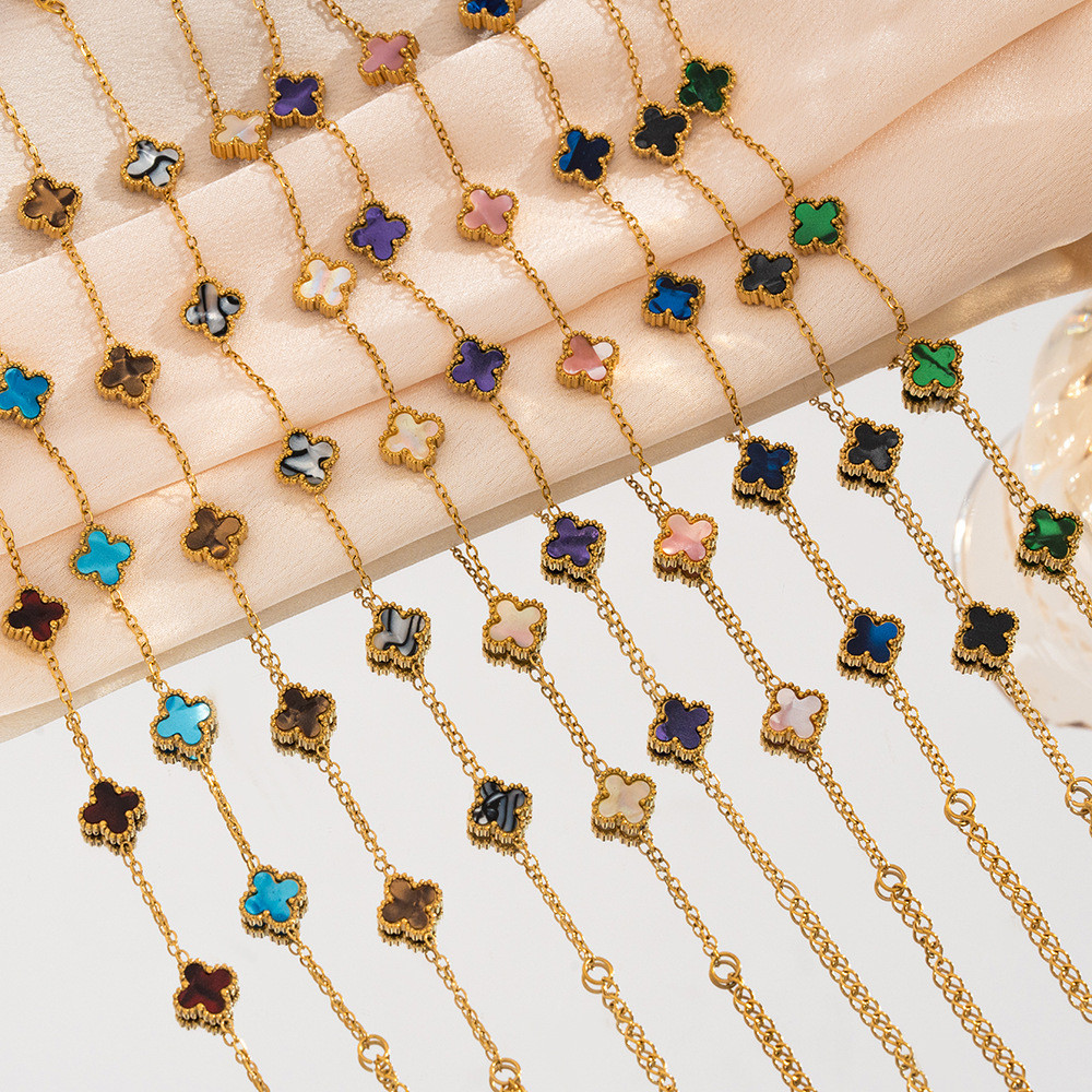 สร้อยข้อมือโคลเวอร์สี่ใบ 9 มม. แสงหรูหรา สำหรับผู้หญิง สไตล์ยุโรปและอเมริกา ไม่ซีดจาง