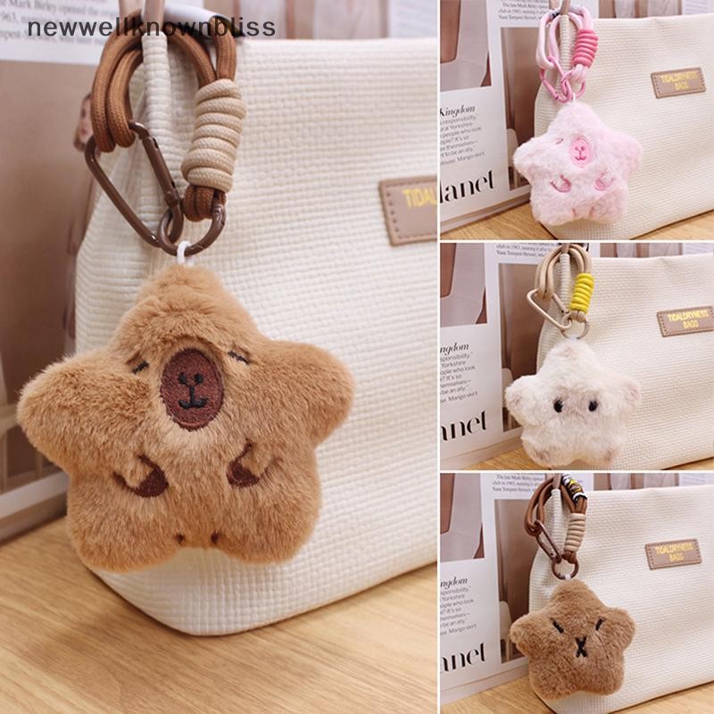 Newwellknownbliss น่ารัก Squeaky Capybara ตุ๊กตาพวงกุญแจน่ารักการ์ตูนสัตว์ Star พวงกุญแจ Kawaii กระเป๋าจี้กระเป๋าเป้สะพายหลังตกแต่งสําหรับคู่ของขวัญ CCD