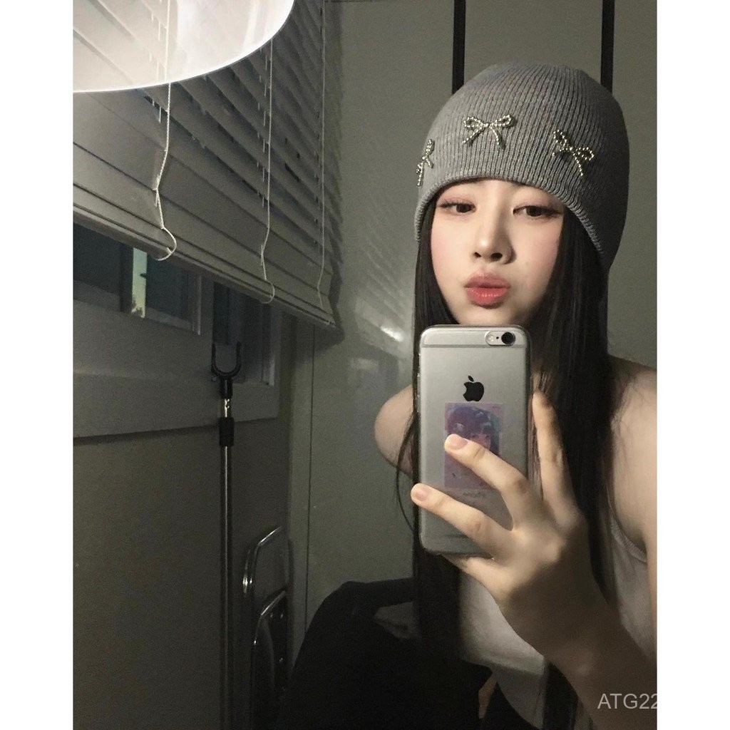 หมวกไหมพรมถักโบว์สไตล์เดียวกับบล็อกเกอร์ชาวเกาหลี INS หมวกคลุมหูแฟชั่นแมตช์ง่ายสำหรับฤดูใบไม้ร่วงและฤดูหนาว