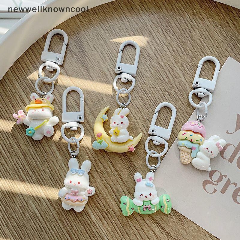 Newwellknowncool New Moon Bunny Candy Cone เรซิ่นพวงกุญแจหูฟังจี้คู่กระเป๋า Charm AAD