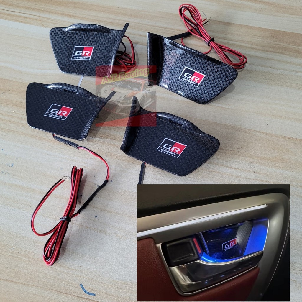 กันรอยพร้อมไฟส่องมือเปิดประตูด้านใน TOYOTA FORTUNER REVO ปี 15-24 พื้นคาร์บอนโลโก้ GR ไฟสีแดง / และสีฟ้า