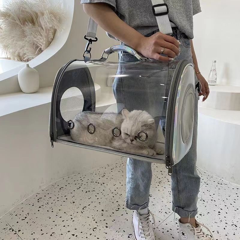 กระเป๋าแมวใสออกนอกบ้านแบบพกพากระเป๋ารถแมวBreathable Space Capsuleกระเป๋าเป้สะพายหลังสัตว์เลี้ยงแบบพกพาCross-body Cat Cage2025.6.21