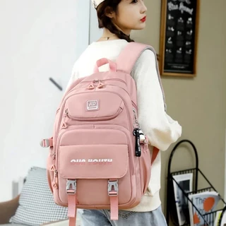 กระเป๋าเป้สะพายหลังแฟชั่นใหม่เวอร์ชั่นเกาหลีอินเทรนด์ความจุขนาดใหญ่สีทึบสําหรับนักเรียนหญิงสีตัดกันลําลองอเนกประสงค์เดินทางกระเป๋าคอมพิว