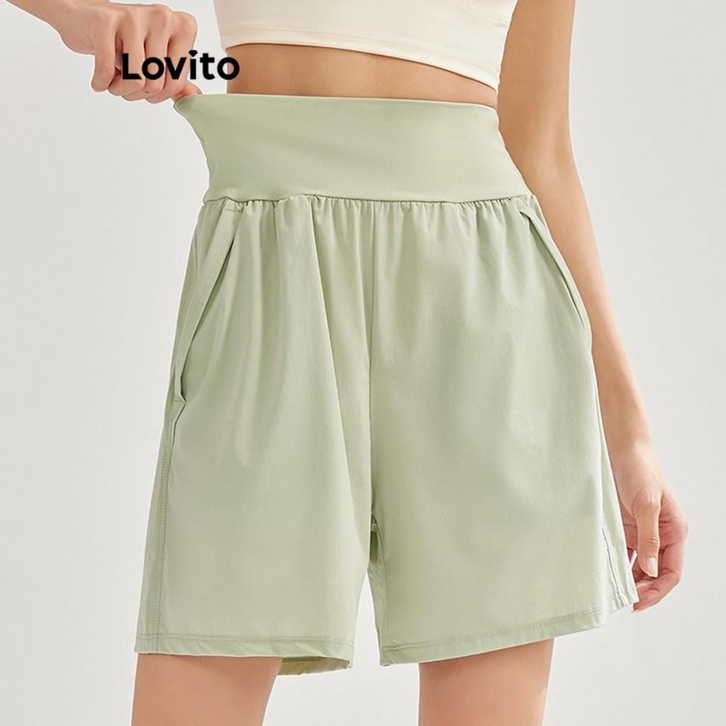 Lovito กางเกงกีฬาขาสั้นผู้หญิง มีกระเป๋า สีพื้น สไตล์สปอร์ต LNL227