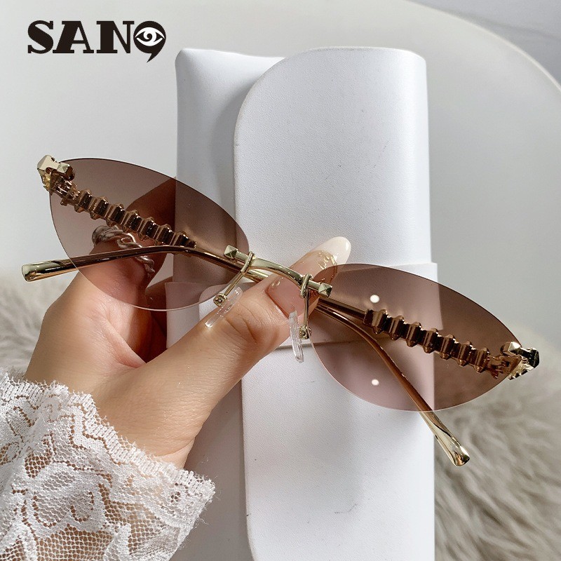 แว่นกันแดดไร้กรอบแบบตาแมวลอยหางานแฟชั่นใหม่สำหรับทั้งผู้ชายและผู้หญิง