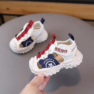 ฤดูร้อนสไตล์ใหม่ชายหญิงเด็กเด็กเด็กทารกนุ่มSoled Casual Toe-Covered รองเท้าแตะสุทธิรองเท้าชายหาด