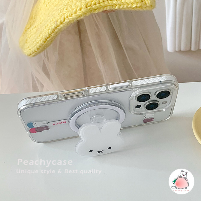 การ์ตูนน่ารัก มิฟฟี่ กระต่ายที่วางยืนชาร์จไร้สายกรณีโทรศัพท์เข้ากันได้สําหรับ ไอโฟน 16 15 14 13 มือโปร สูงสุด 16โปรแม็กซ์ อะคริลิคล้างปกหลังปลอกกันกระ - รูปที่ 3