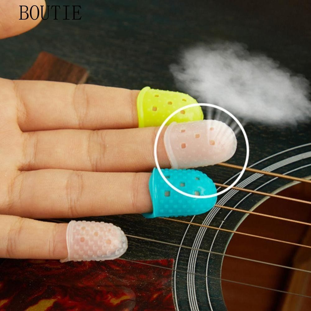BOUTIE 4 ชิ้น/เซ็ตกีตาร์ปลายนิ้วป้องกัน,ลื่นยาง Thimble ซิลิโคนยามนิ้ว,สบายเย็บเครื่องมือทําอาหาร DIY Craft ถุงมืออุปกรณ์กีตาร์เล่นเปียโน