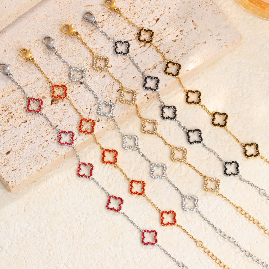 หลายสีตัวเลือกกลวงโคลเวอร์สี่ใบเหล็กไทเทเนียมสร้อยข้อมือผู้หญิงการออกแบบแฟชั่นเครื่องประดับมือที่สวยหรูผู้หญิง