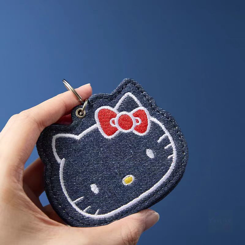 ของแท้ MINISO Hello Kitty CLASSIC Series แขวนโซ่จี้กระจกผ้ายีนส์กระเป๋าเก็บกระเป๋าเครื่องสำอางแบบพกพา