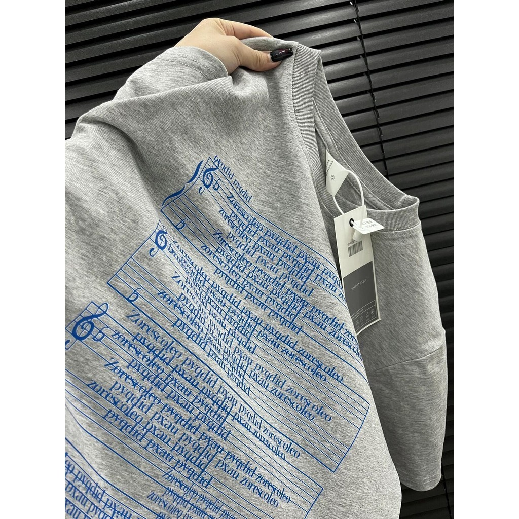 พร้อมส่ง เสื้อ เสื้อยืดแฟชั่นพิมพ์ลายยอดนิยมของเกาหลีสไตล์ลำลองแขนสั้นฤดูร้อนผ้าฝ้ายแท้หลวม สำหรับผู้ชายและผู้หญิง