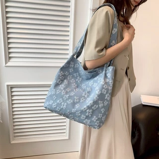 (ส่งด่วน)xspeedfashion(X2391) กระเป๋าผ้าสะพายไหล่ ผ้าแคนวาสลายดอกไม้-ใบใหญ่