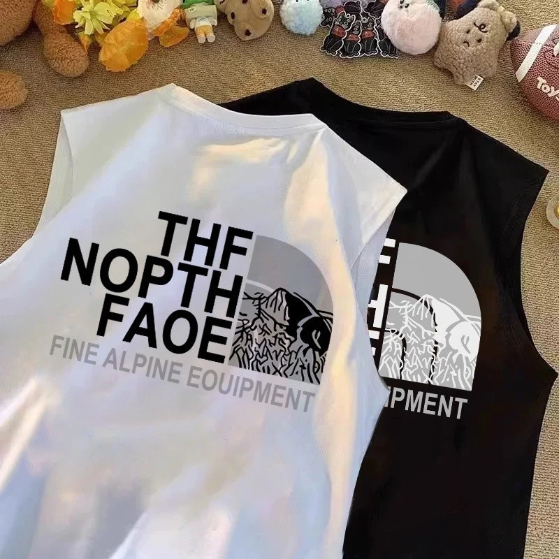💫 เสื้อแขนกุด พิมพ์"THE NOPTH FAOE" เสื้อกั๊กแขนกุดชาย ฝ้าย100% อเมริกันย้อนยุค สวมใส่สบาย แฟชั่น M-3XL OVERSIZE 👓
