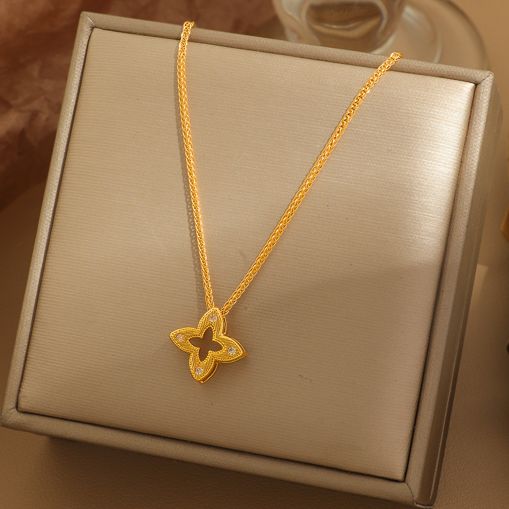 แฟชั่น Simple Golden Hollow Four-Leaf Clover สร้อยคอหญิง Retro High-End เครื่องประดับ