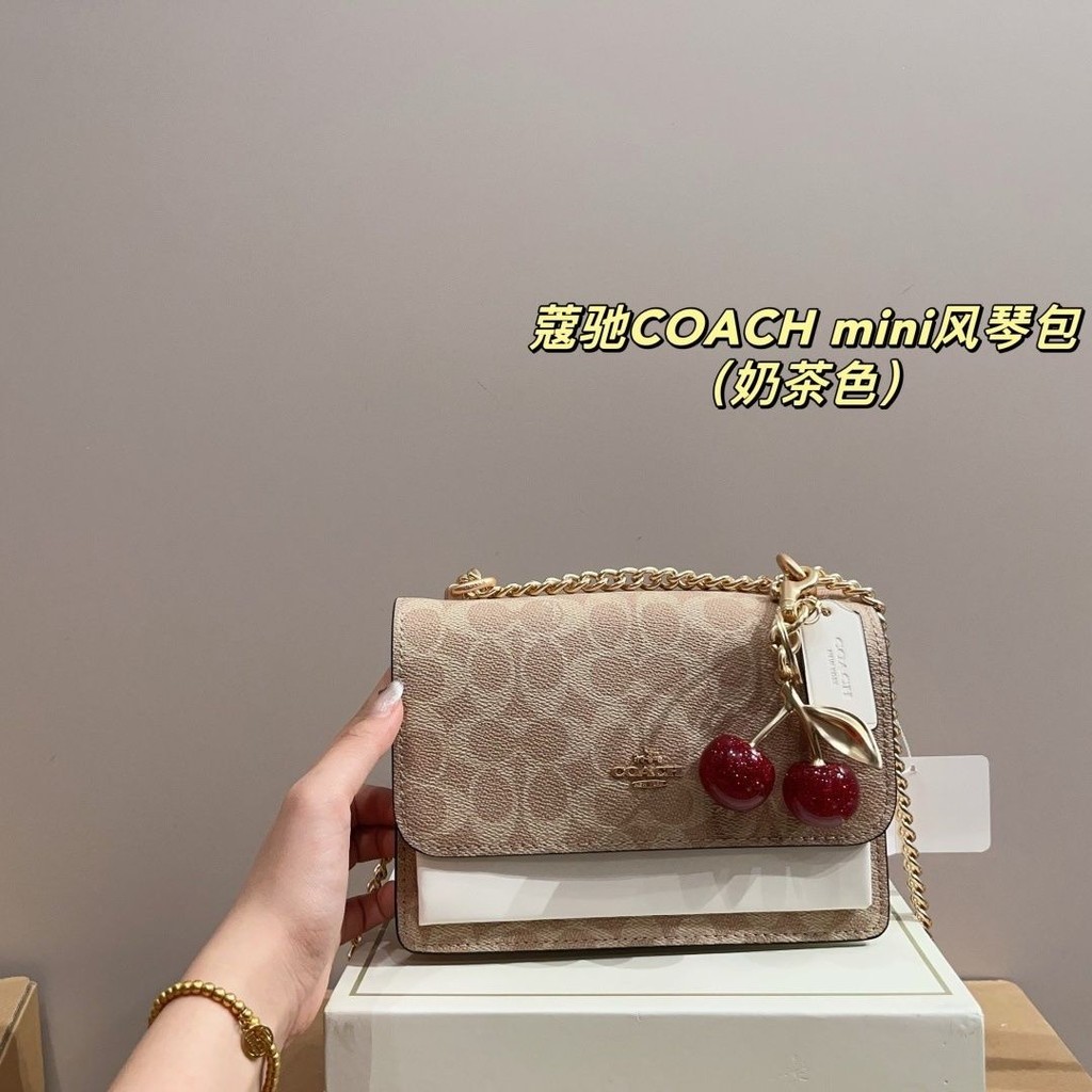 กระเป๋าสะพายข้าง COACH แบบเรียบหรู กระเป๋าใต้แขน กระเป๋ามินิแบบหีบห่อ