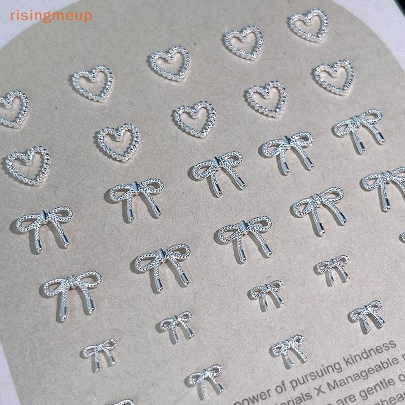 [risingmeup] 10 ชิ้นโลหะผสม Bowknot Love Nails Art Charms ตกแต่ง 3D โลหะหรูหรา Silver Bows รูป Jewellery DIY เล็บออกแบบอุปกรณ์ใหม่ - รูปที่ 2