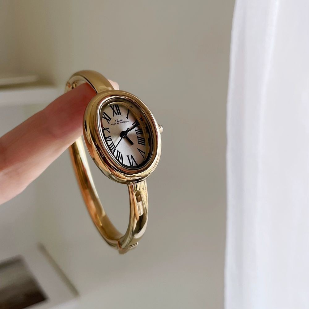 นาฬิการูปไข่หญิงเรียบง่ายรูปไข่ตัวชี้วงเหล็ก