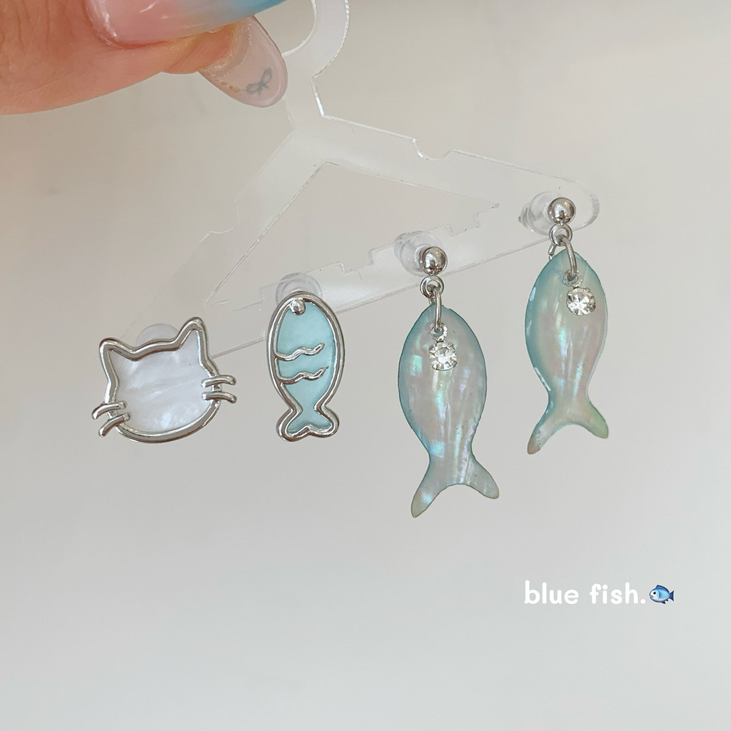 Ocean Blue Cat ต่างหูผู้หญิงเกาหลีรุ่น Fritillary เลเซอร์ปลาเงินเข็มต่างหู Simple Cool การ์ตูนสด