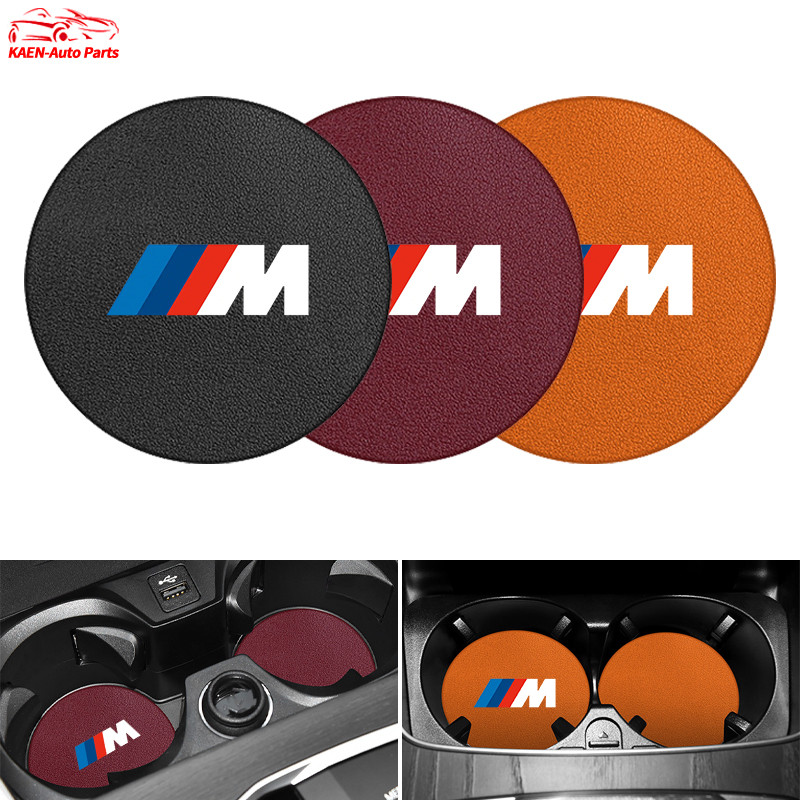 1ชิ้น สำหรับ BMW แผ่นรองแก้วน้ําในรถยนต์ หนังแผ่นรองแก้วน้ําในรถยนต์ แผ่นรองแก้วน้ำในรถ​​ กันลื่น แผ่นรองแก้วเครื่องดื่ม BMW M F30 F10 E90 E46 E60 G20 G60 E30 E39 E36 G30 F34 E92 G22 F44 M2 M3 M4 F32 Z4 E89 E85 X5 G05 F15 E53 G32 F20 IX G12 IX3 G08 G45 X3