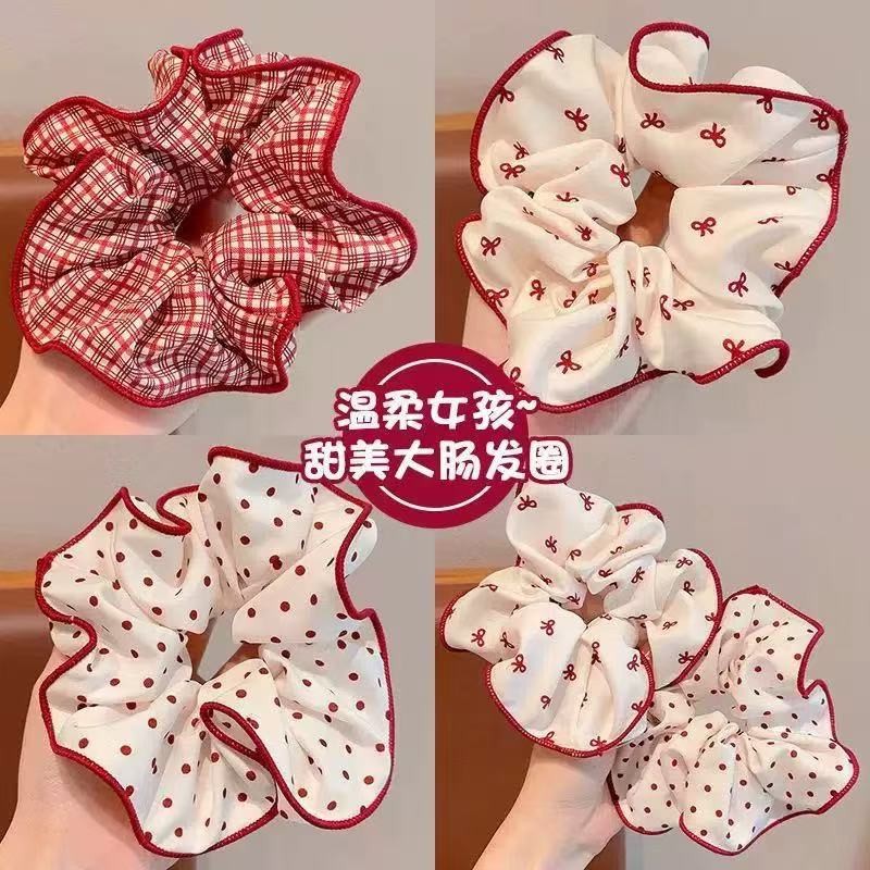 แหวนผมลําไส้ขนาดใหญ่ลายจุดสีแดงอ่อนโยนสําหรับผู้หญิง2025แหวนผมหางม้าแบบใหม่ที่คาดผมลูกบอล