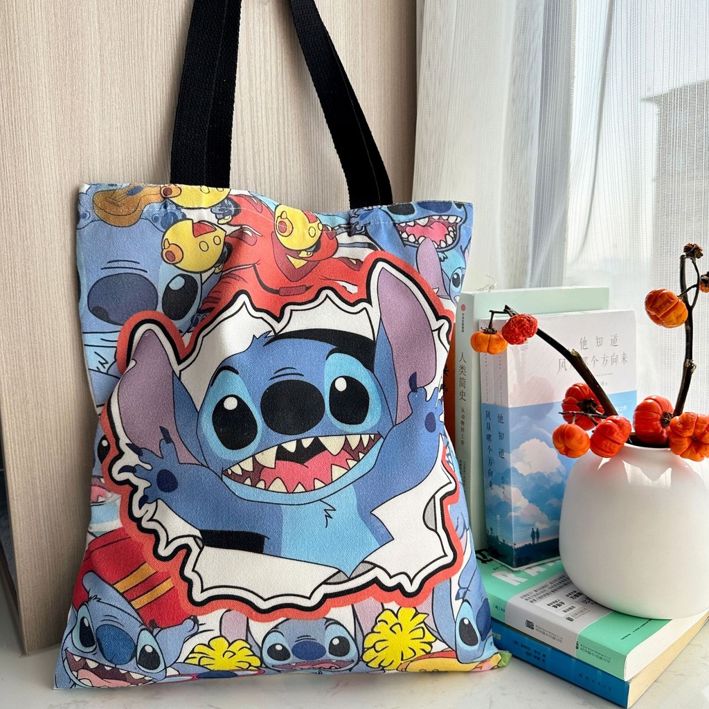 Lilo & Stitch กระเป๋าถือกระเป๋าสะพายผ้าใบ Crossbody Shopping Bag ความจุขนาดใหญ่ Lilo และ Stitch กระเป๋าเก็บนักเรียน