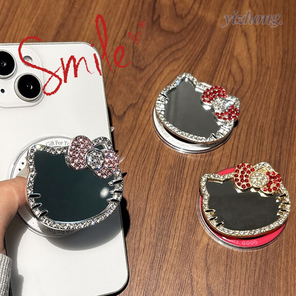 Magnetic Attraction Hello Kitty ที่วางโทรศัพท์ Kickstand Shinining Luxury Rhinestone Mirror Design สําหรับโทรศัพท์มือถือ Naked Magsafe กรณีแท็บเล็ตโทรศัพท์มือถือ Anti-drop PC Bracket