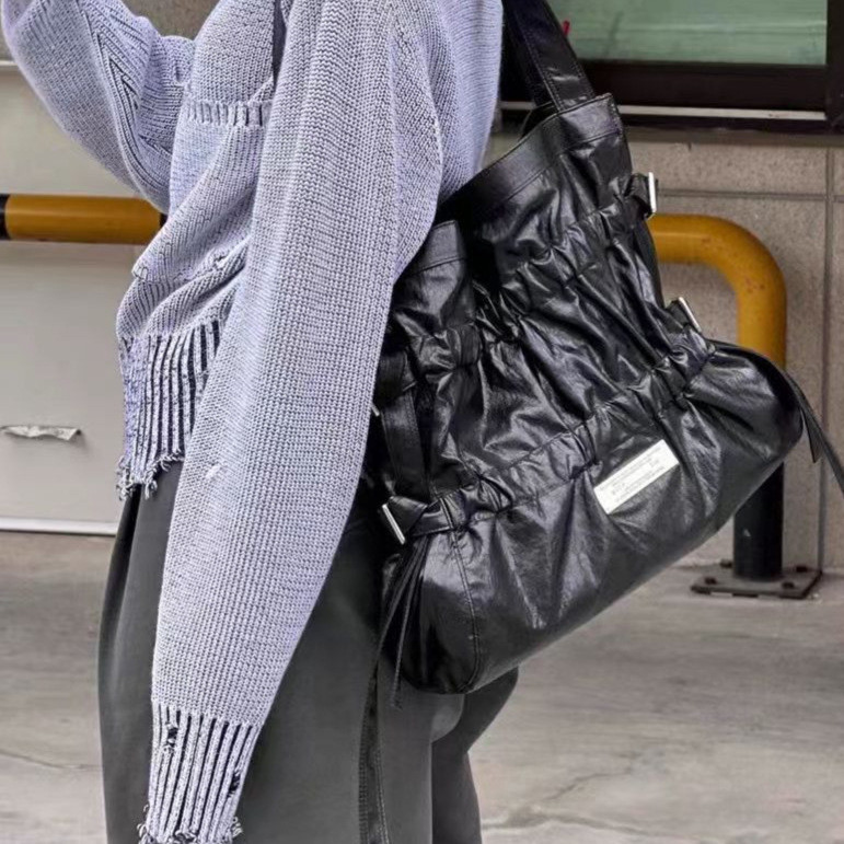 เกาหลี Matin Kim จีบ Drawstring Bow กระเป๋าใต้วงแขน