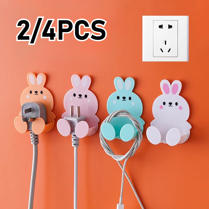 2/4PCS ผู้ถือปลั๊กติดผนังพร้อมตะขอกาว Doubles As Key กระเป๋าแขวนห้องครัว
