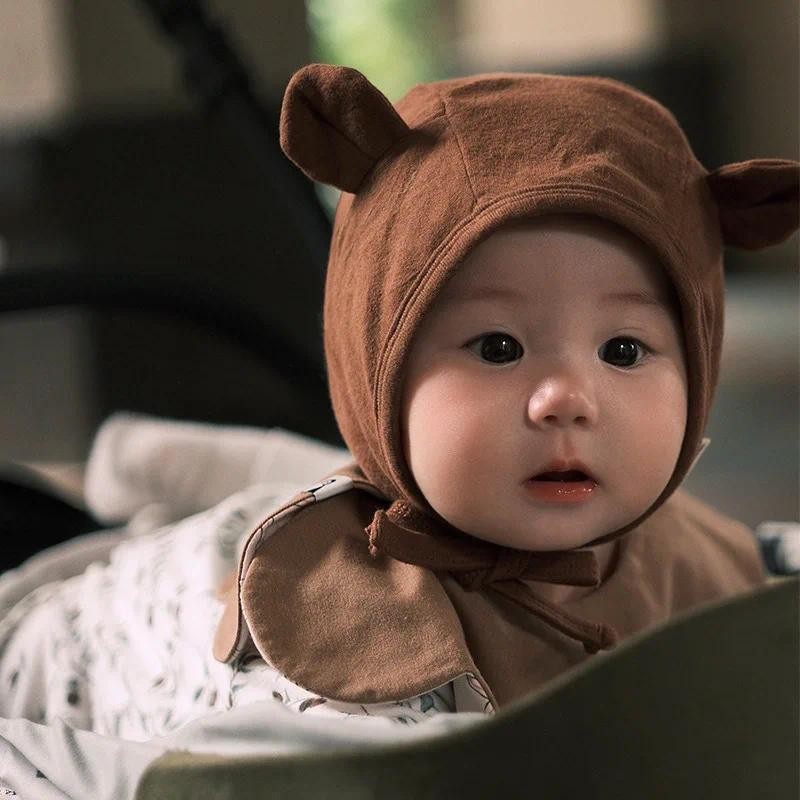 น่ารักหูเด็กหมวกสีทึบผ้าฝ้ายทารกแรกเกิดเด็กสาวป้องกันหูหมวกกลางแจ้งWindproofทารกเด็กวัยหัดเดินหมวก Lacing Bonnet