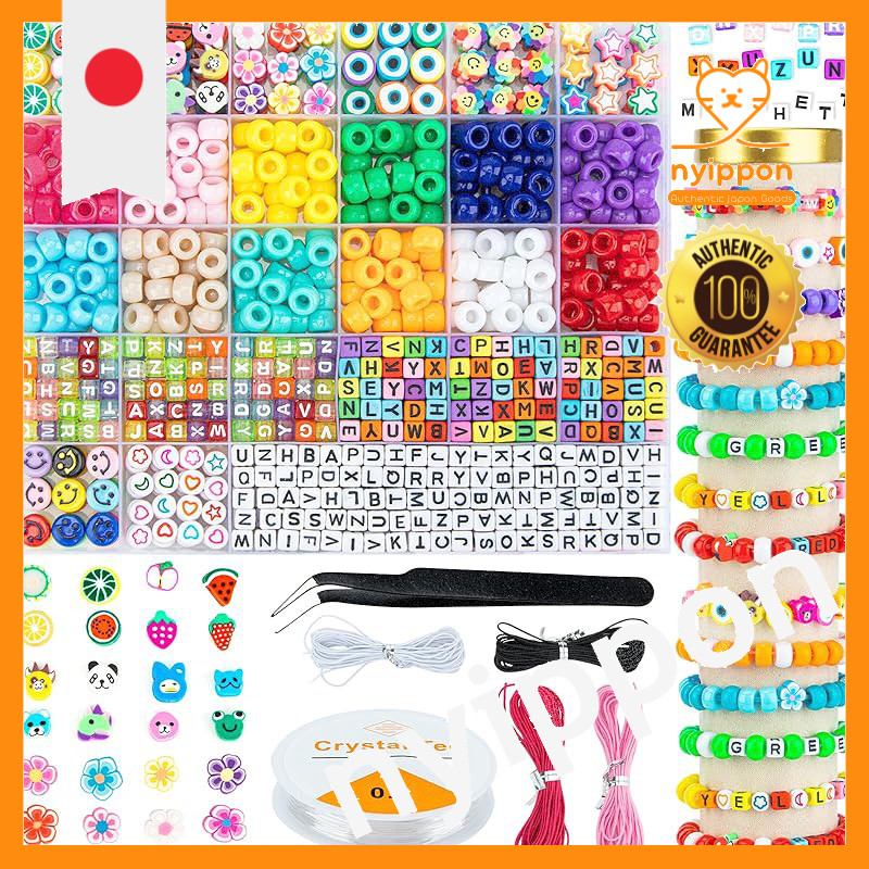 Pony beads, alphabet letter beads, smiley face beads, and polymer beads, along with elastic strings 