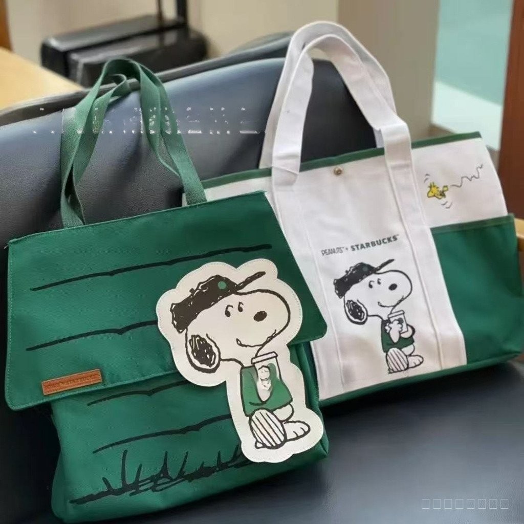 กระเป๋าผ้าแคนวาสใหม่จากคอลลาบอเรชัน Snoopy | กระเป๋าสอนขนาดใหญ่กันน้ำและกันสิ่งสกปรกสำหรับผู้หญิง ใช้ได้ทั้งแบบถือและสะพายข้าง สไตล์เกาหลี แฟชั่นกระเป๋าสำหรับนักเรียนและผู้เดินทาง ​