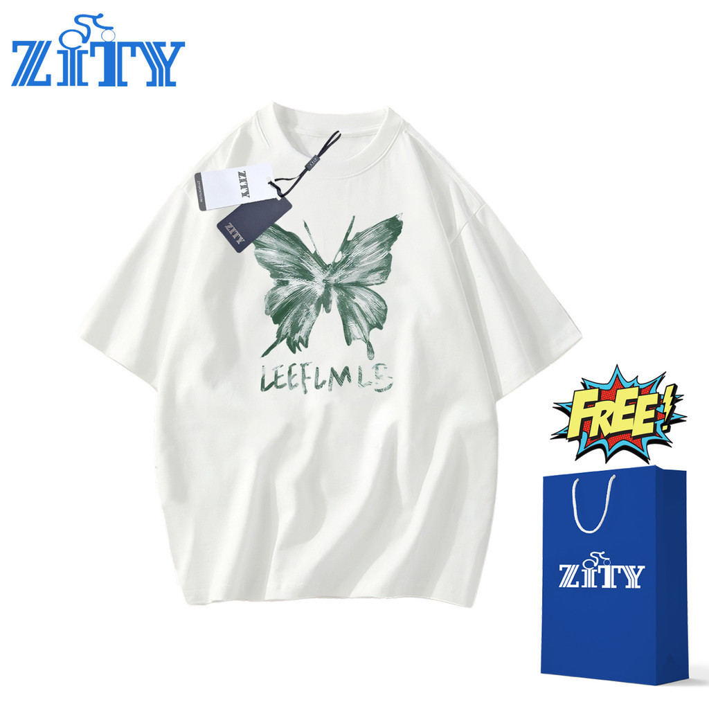 "LEEFLMLES" เสื้อยืดผีเสื้อสีเขียวการ์ตูน NASALEE ย่อหน้าเดียวกันเทรนด์เยาวชนสไตล์ Oversize