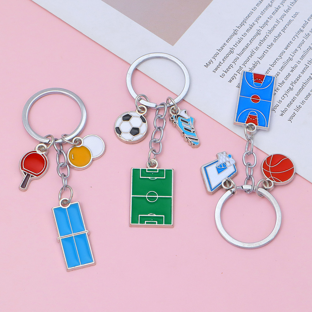 คลาสสิก Sporting Ball Key แหวนสร้างสรรค์ฟุตบอลบาสเกตบอลแบดมินตันพวงกุญแจโลหะผู้ชายกระเป๋าเป้สะพายหลังตกแต่ง