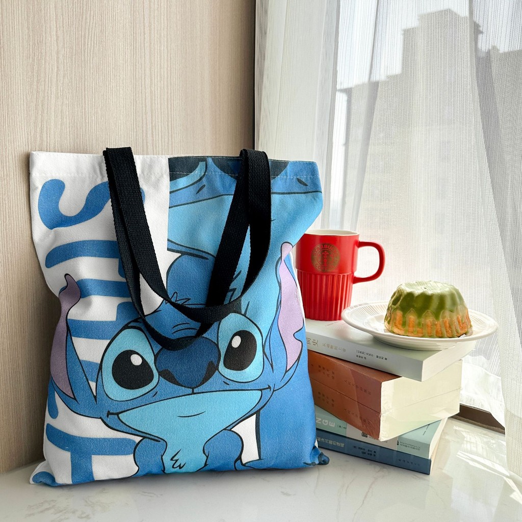 Lilo & Stitch กระเป๋าถือกระเป๋าสะพายผ้าใบ Crossbody Shopping Bag ความจุขนาดใหญ่ Lilo และ Stitch กระเป๋าเก็บนักเรียน ราคา ถูกที่สุด ดีลบีเคเค แกลเลอรีภาพที่ 3