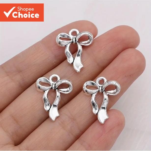 10 ชิ้นชุบเงินโบว์ Charms จี้จํานวนมากสําหรับเครื่องประดับทํา DIY สร้อยคอสร้อยข้อมือต่างหู Key Chain อุปกรณ์เสริมธุรกิจขนาดเล็กอุปกรณ์