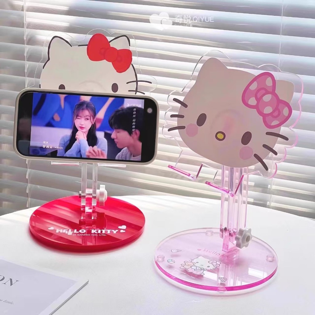 Hello Kitty Melody ที่วางโทรศัพท์มือถือมัลติฟังก์ชั่นสไตล์ใหม่อะคริลิคการ์ตูนแท็บเล็ตแบบปรับได้ PC Lazy Holder ของขวัญ