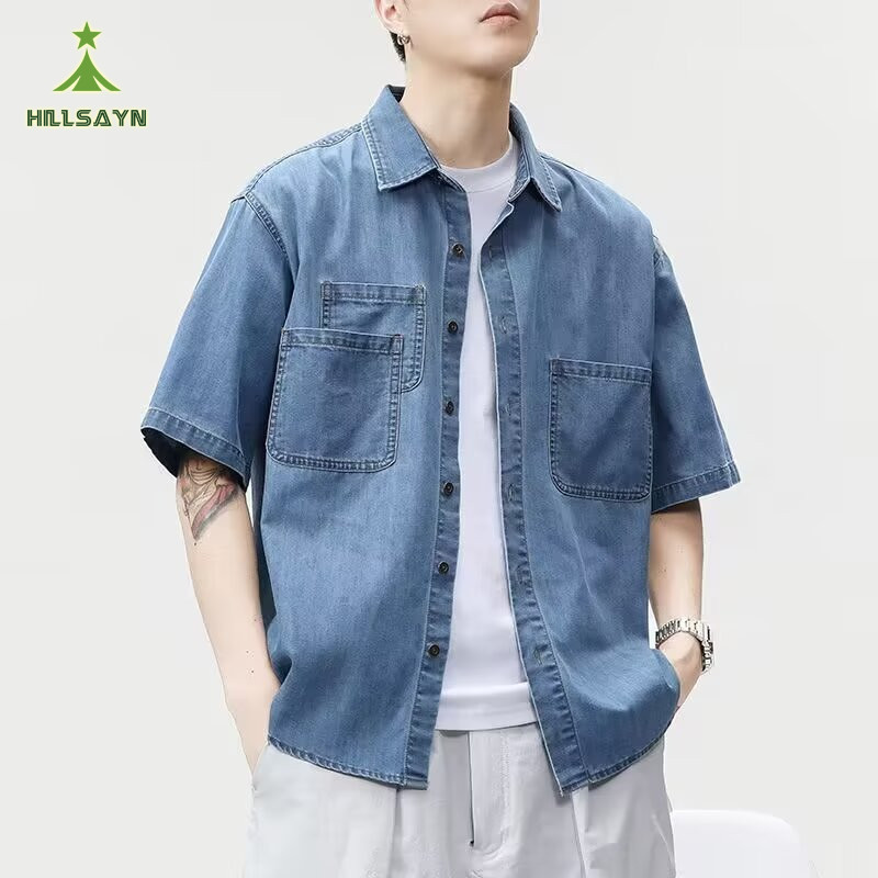 HillsayN เสื้อเชิ้ตแขนสั้นผู้ชายผ้ายีนส์บางนัวเนียหล่อมีสไตล์ไหลหลวมกระเป๋าหลวม