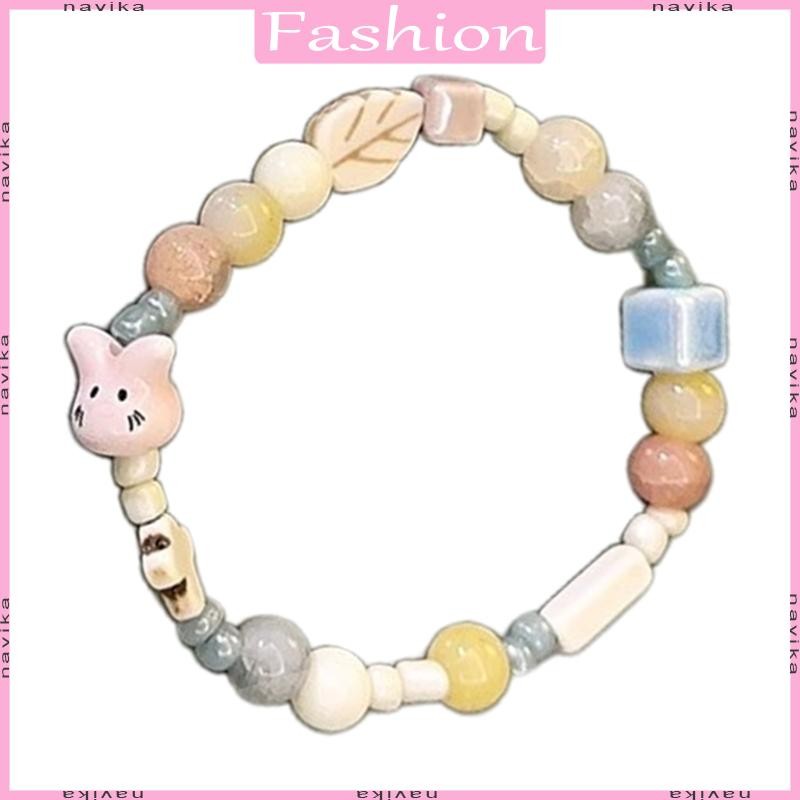 NAV Handmade สร้อยข้อมือลูกปัดเซรามิคแบบไม่ซ้ำกัน กระต่ายน่ารัก Handchain ประณีตยืดหยุ่น กระต่ายสร้อ