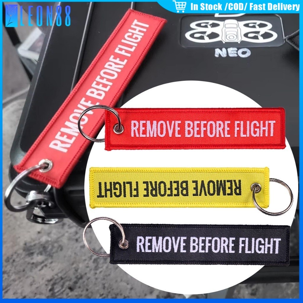 ของมาใหม่！พวงกุญแจริบบิ้น remove before flight keychain ธงนิรภัย ห้อยกระเป๋า