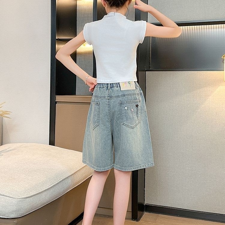 กางเกงห้าส่วนผ้ายีนส์เด็กหญิง2025ฤดูร้อนแบบใหม่แบบบางระบายอากาศทรงหลวมสำหรับเด็กหญิงวัยกลางและใหญ่กางเกงขาสั้นใส่ด้านนอกแมทช์ลุคง่าย - รูปที่ 4