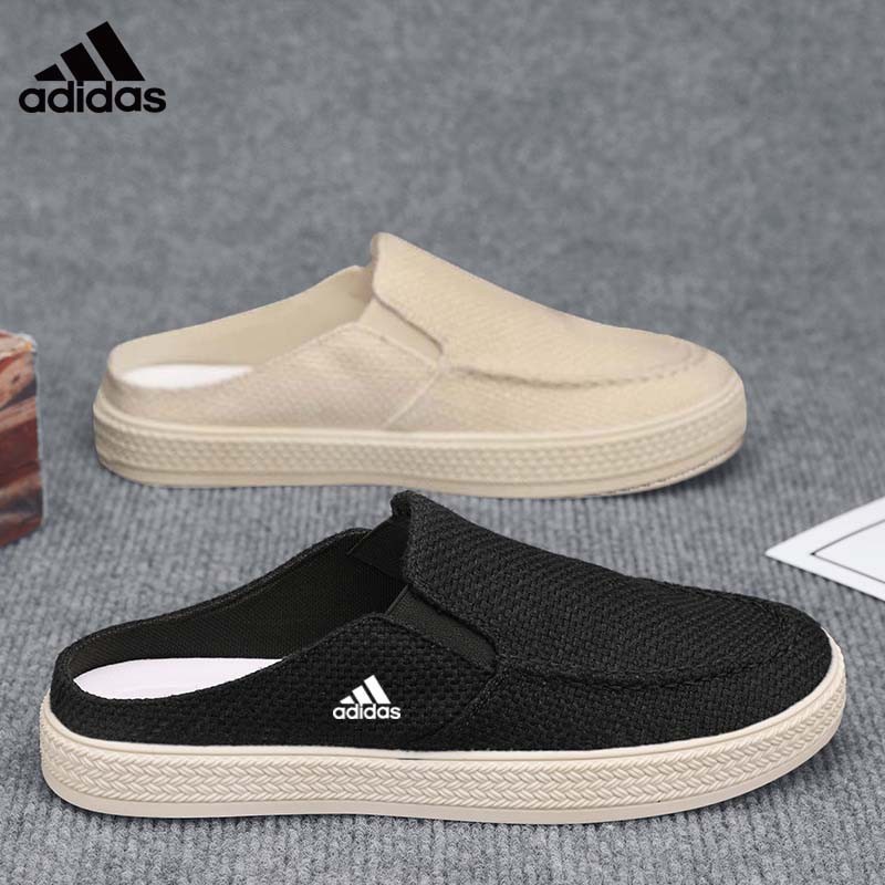 ฤดูร้อนใหม่รองเท้าผู้ชายอินเทรนด์สบาย ๆ สบายครึ่งสนับสนุนแบนอเนกประสงค์รองเท้าผ้าใบระบายอากาศ 2025